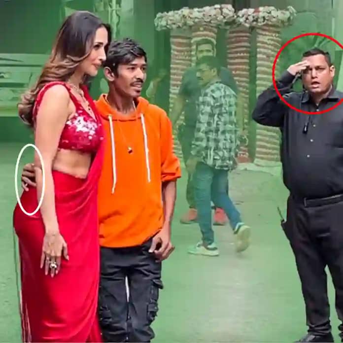 Physical Disable Fan Put Hand Around Mallika Arora's Waist during taking photo